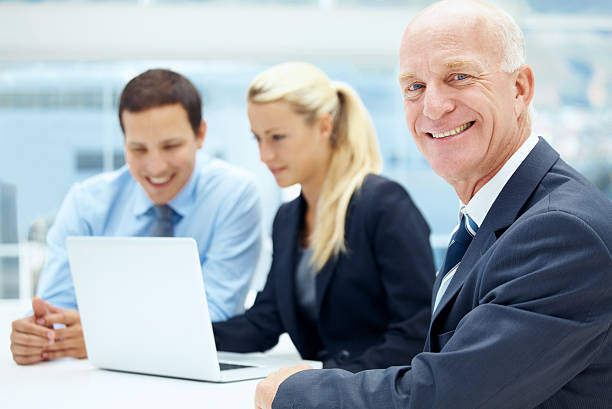 istock Guiding them with his wealth of experience 483266091