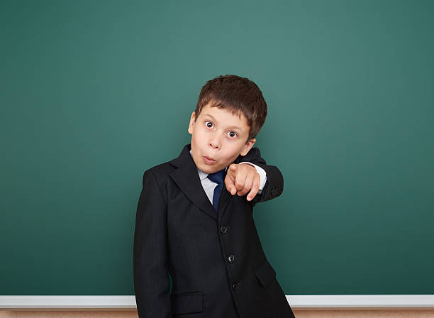 istock school boy portrait near board 483266098