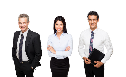 View of business people standing together and smiling isolated over white background