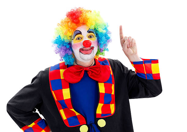 istock Happy clown pointing upward 483267502