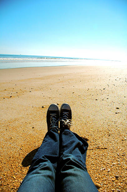 istock Shoes on the beach 483276382