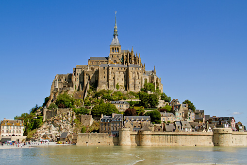 Mont Saint-Michel, a medieval fortification, cloister and church on an island in the Atlantic ocean near Normandy in France. 