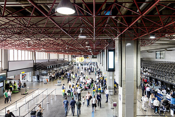 International Gru Airport located in Sao Paulo, Brazil Sao Paulo, Brazil - April 25, 2014: People walking at the International Gru Airport located in Sao Paulo, Brazil guarulhos photos stock pictures, royalty-free photos & images
