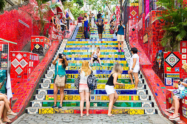 Rio de Janeiro, Brazil - November 30, 2014: Tourists visiting the Selaron stairway in Rio de Janeiro, Brazil. The stairway is famous work of Chilean artist Jorge Selaron.
