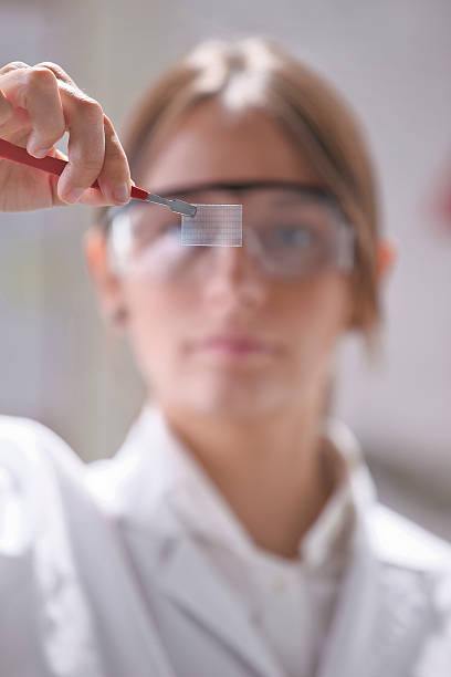 Scientific showing a piece of graphene with binary numbers. Transparent of graphene application. lead cut glass crystal stemware stock pictures, royalty-free photos & images