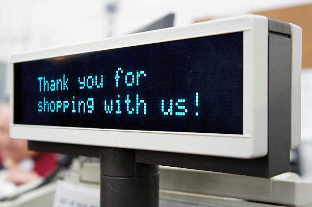 Thank you for shopping Thank you for shopping with us sign on cash register display. cash register photos stock pictures, royalty-free photos & images