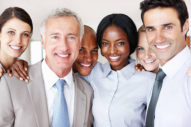 istock Mixed race business people smiling 483288503