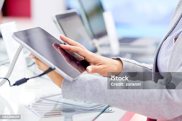 Buying Digital Tablet Stock Photo - Download Image Now - Buying, Choice, Choosing