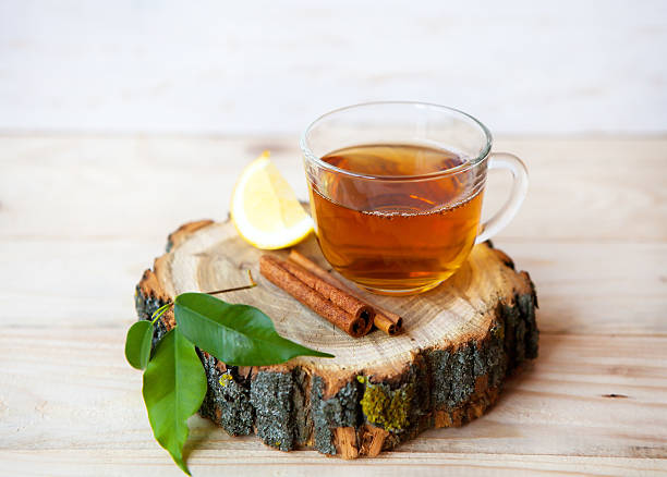 istock cup of tea with cinnamon sticks and lemon slice 483288600
