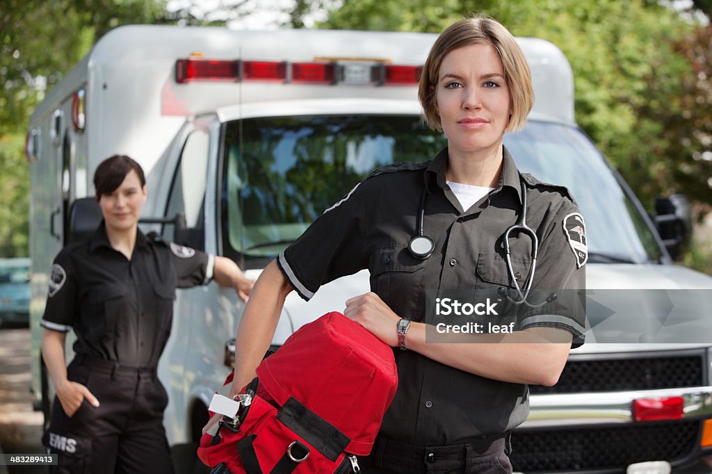 EMS with Oxygen EMS professional with portable oxygen equipment Paramedic Stock Photo
