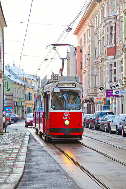 Vienna, Austria - November 27, 2010: OEBB streetcar in vienna passes by on snow covered rails  in Vienna, Austria. OEBB exists since 1947 and coveres a net of ca 5700 km in Austria.