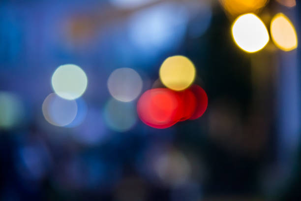 istock abstract background of blurred street lights with bokeh effect 483290425
