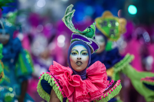 Florianópolis, Santa Catarina, Brazil - March 2, 2014: Members of a local samba school called Unidos da Coloninha, performing during the Carnaval of Florianópolis, Santa Catarina in the Sambadrome located in the City Center