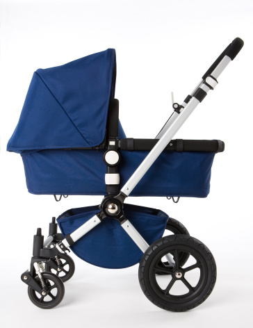 profile of a blue baby buggy on white