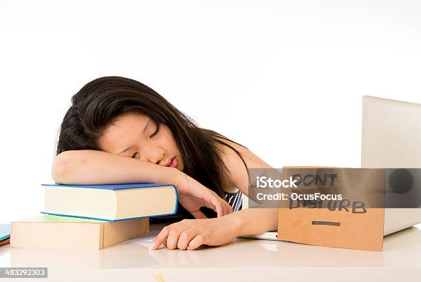 Young Pretty Chinese Asian Student Tired Asleep On Laptop Stock Photo - Download Image Now
