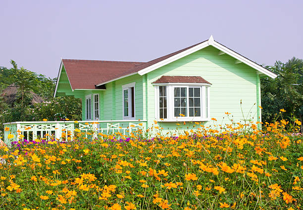 istock Small house in a garden 483292373