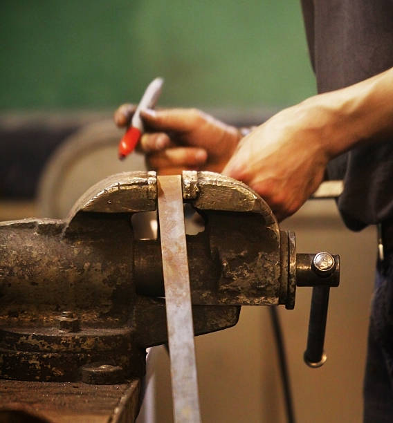 istock blacksmith measuring the lengh of a metal material he 483292574