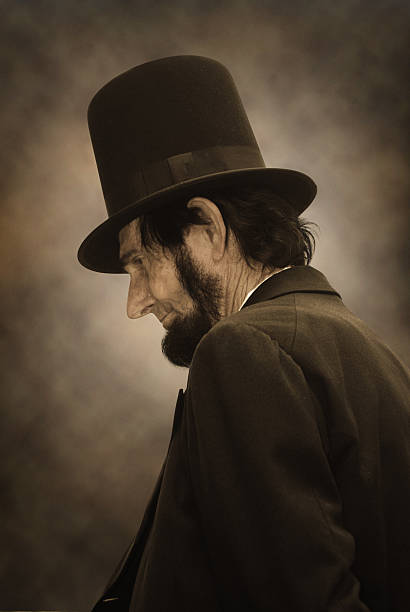 Abraham Lincoln Profile Sepia tone photo of Abraham Lincoln in profile abraham lincoln stock pictures, royalty-free photos & images