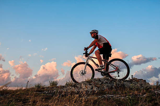 istock Biker riding on bicycle in mountains 483293228