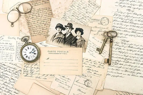 old letters and postcards, antique accessories and photo. nostalgic sentimental background. ephemera