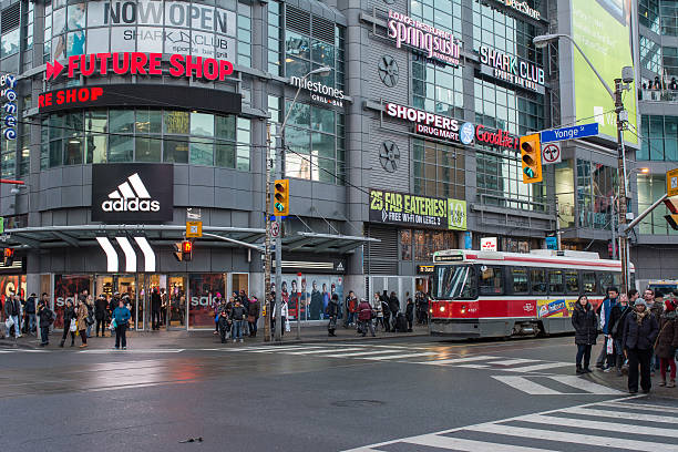 Dundas Square in Downtown Toronto Main Commercial and Multicultural Centre Toronto,Canada-December 28, 2013: Main downtown intersection of Yonge and Dundas in Toronto. Also known as Dundas square one of the main commercial hot spots in the city. Toront o is Canada's largest city and sixth largest government, and home to a population of 2.8 million people. toronto dundas square stock pictures, royalty-free photos & images