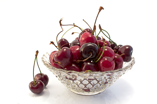 Crystal bowl full of cherries