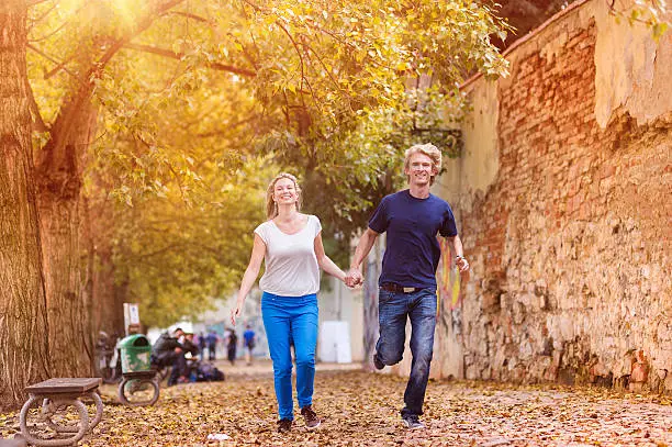 Photo of Young couple taking a walk