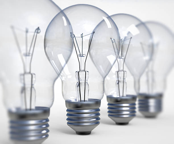 istock row of bulbs with one bulb in focus 483302536