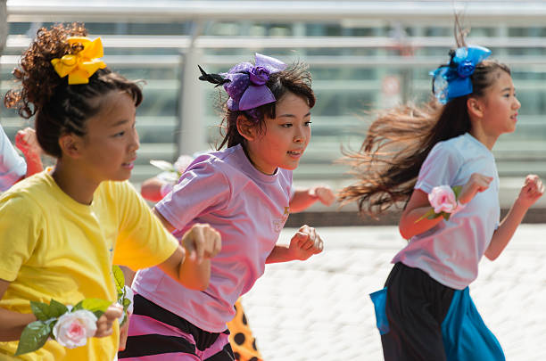 Yokohama, Japan - August 1, 2015: Japanese young girls are dancing in the Yokohama Dance Parade which is held on August 1 through 2 in 2015 in Yokohama, Japan.