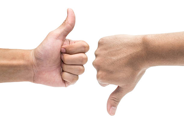 istock Thumb up and thumb down hand signs 483304360