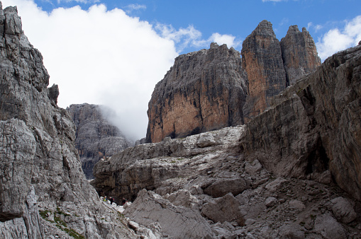 Madonna di Campiglio, Brenta, Italy – September 13, 2013: Polish climbers are following on via Ferrata Bocchette Centrali, Dolomites Brenta