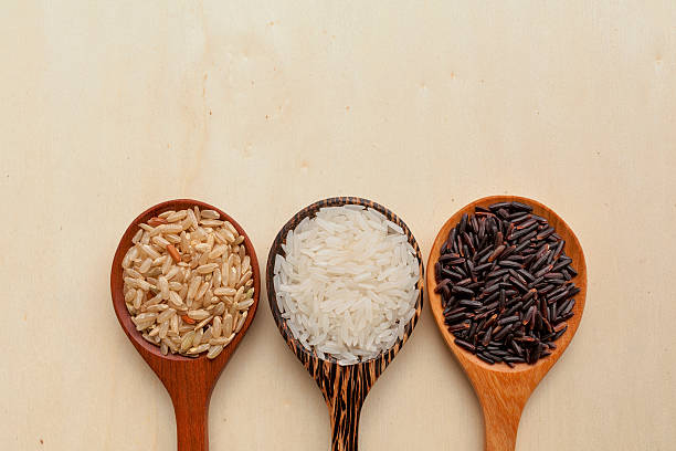 istock Wooden rice spoon on wood background 483310566