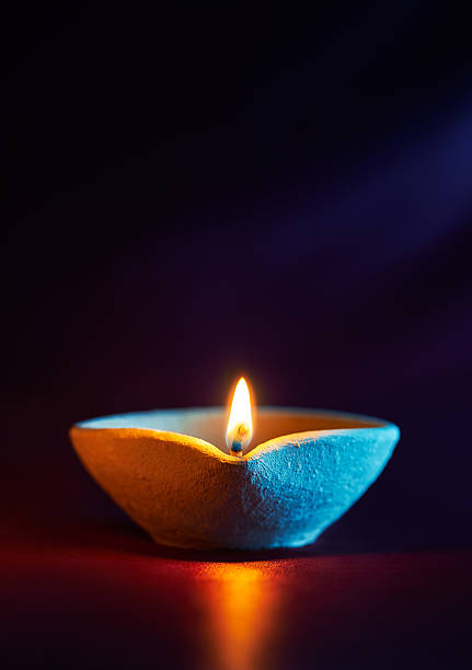 diwali oil lamp - diwali lights stock-fotos und bilder