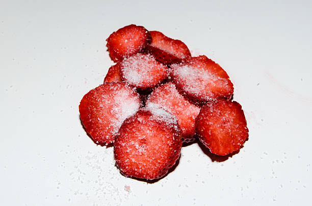 Sliced Strawberries with sugar stock photo