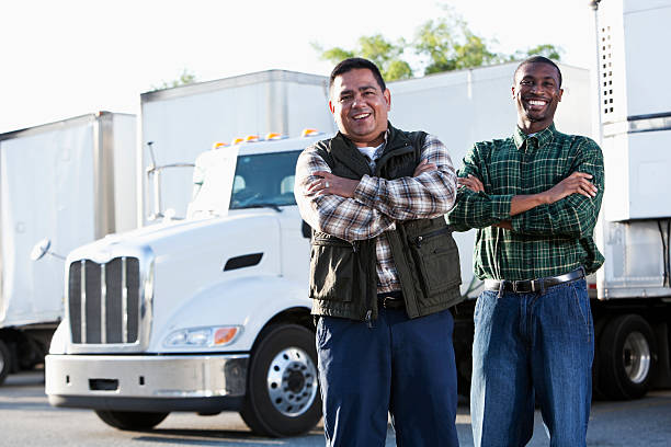 multi-étnica motorista de caminhão - truck driver multi ethnic group industry working class - fotografias e filmes do acervo