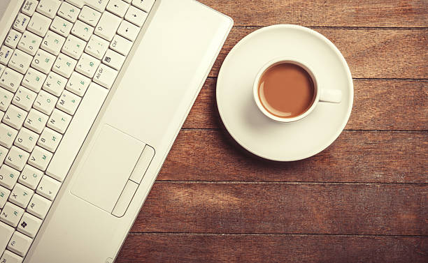 istock Cup of the coffee on a wooden table. 483315915