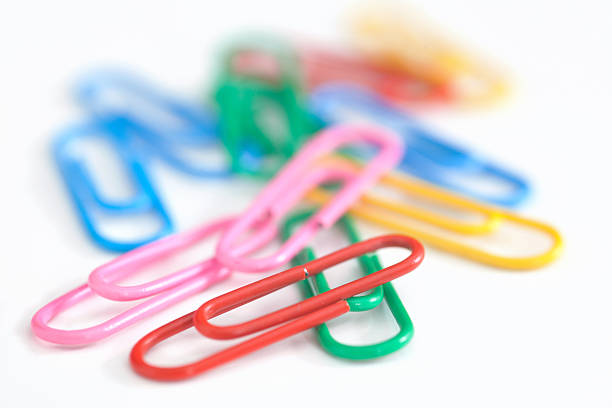 multicolored paperclips - stack paper document file zdjęcia i obrazy z banku zdjęć