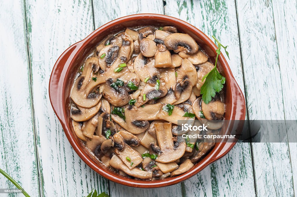 Garlic mushrooms series 06 Garlic mushrooms with white wine and parsley Appetizer Stock Photo