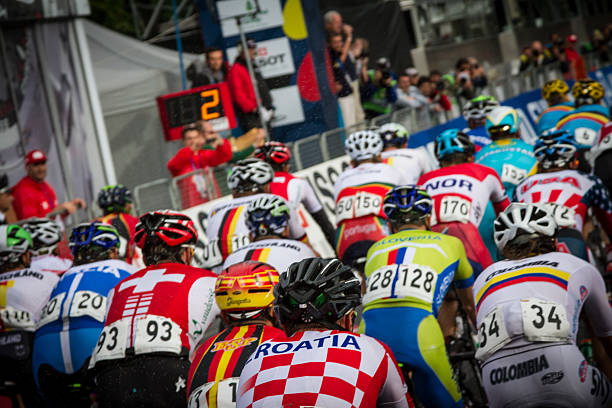2013 UCI Road World Championship. Florence. 2 laps to go Florence, Italy - September 29, 2013:  Group of cyclists at the 2013 UCI Road World Championship in Florence, Italy. Second-last lap to the end of the competition. uci road world championships stock pictures, royalty-free photos & images