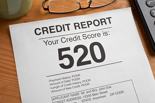 Low Credit Report Number.  Form on a desktop.  Artwork created by the photographer.