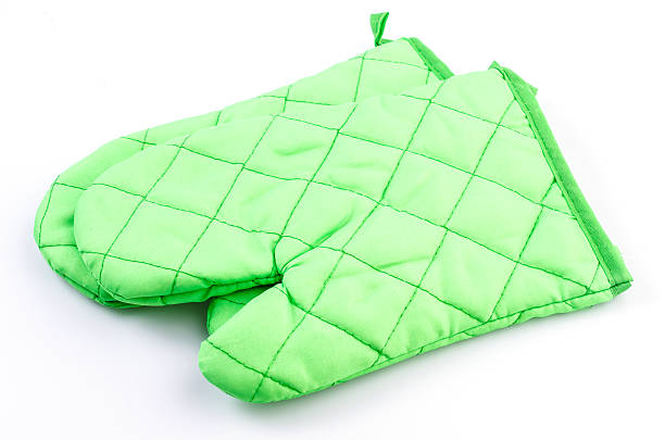 istock Green oven glove on isolated white background 483319451