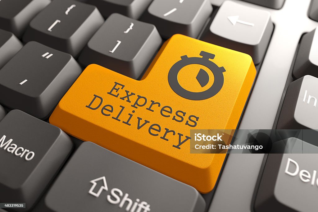 Keyboard with "Express Delivery" Button. "Express Delivery" - Orange Button on Computer Keyboard. Business Concept. Business Stock Photo