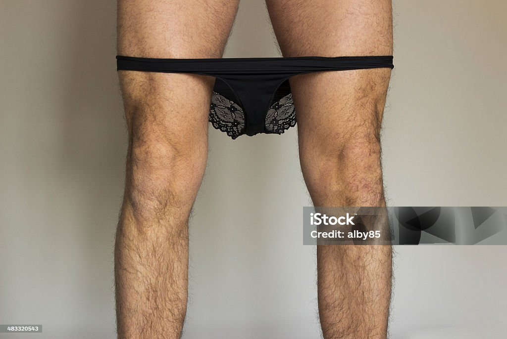 what's going to be underneath? man wearing woman's slip Cross Dressing Stock Photo