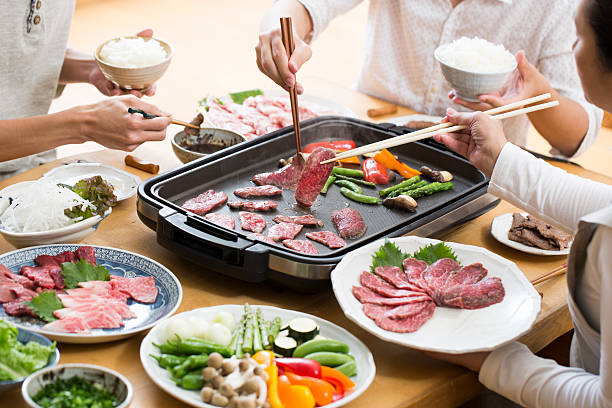 Eat grilled meat Yakiniku meals, home cooking griddle stock pictures, royalty-free photos & images
