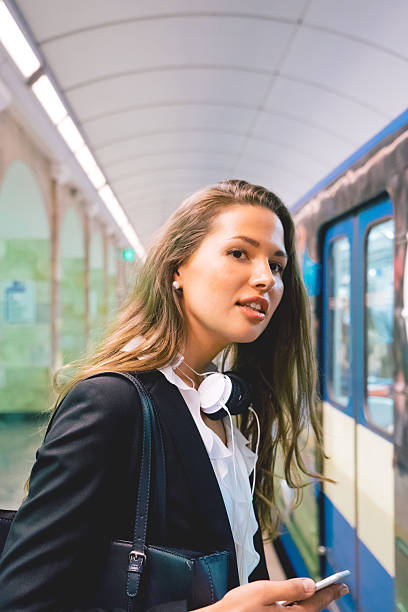istock Beautiful Woman Waiting For The Subway Train 483330960