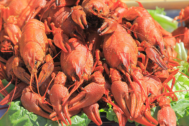 istock Red cooked crayfish on a city street 483332106