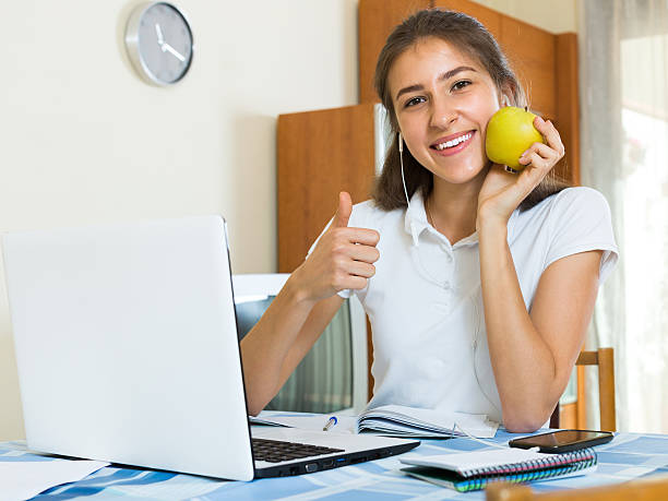 istock Teenager girl doing homework 483332382
