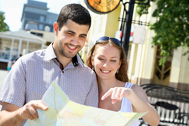 istock Young couple walking around the city 483332824