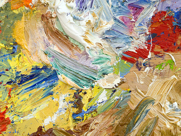 istock Oil paints palette vibrant multi-coloured full frame background close up 483336456