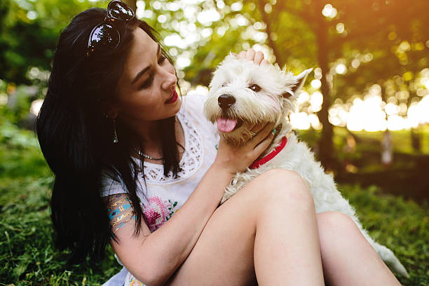 istock girl with her dog 483336648